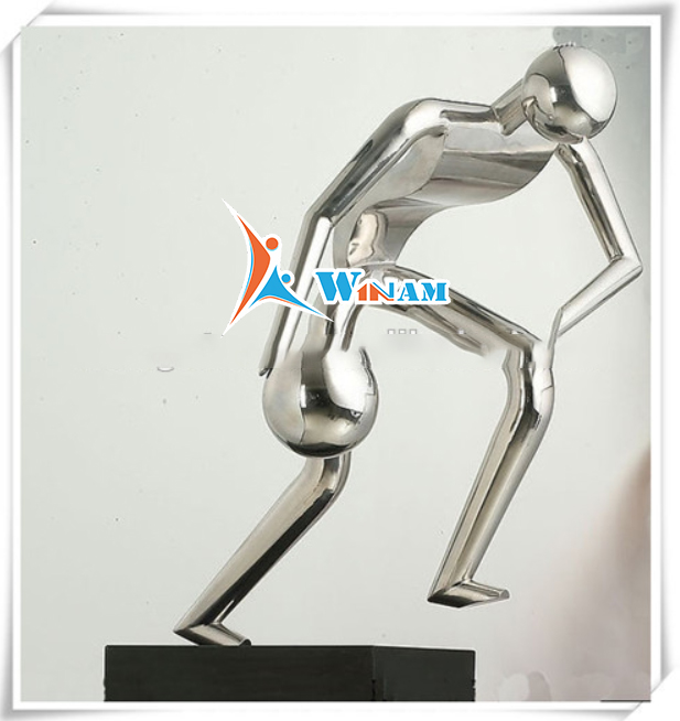 Flexible basketball player stainless steel sculpture