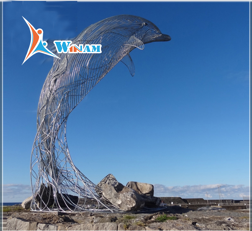 Large abstract outdoor dolphin sculpture
