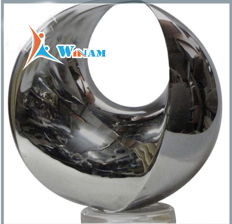 Folk Art Style stainless steel abstract polished sculpture