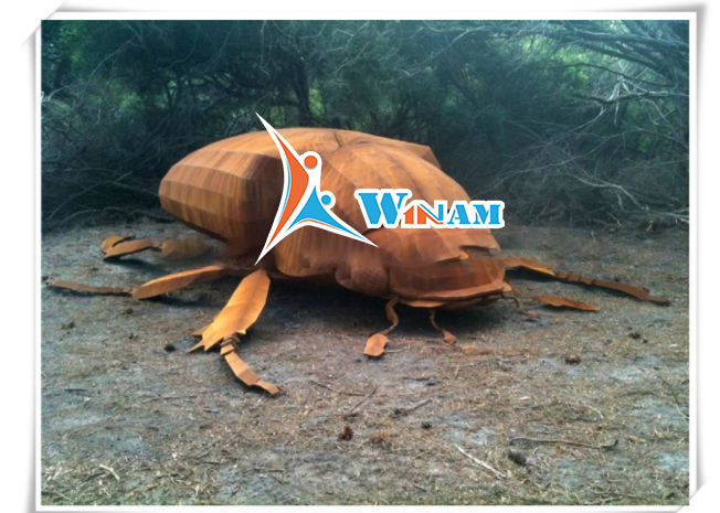 Large vivid beetle corten steel outdoor sculpture
