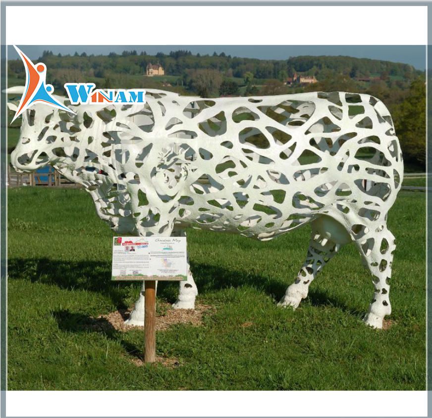 Painted white large garden metal cow sculpture
