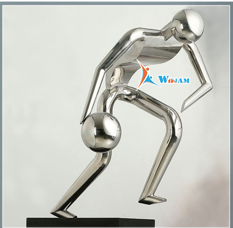 Modern stainless steel little boy playing ball garden statues