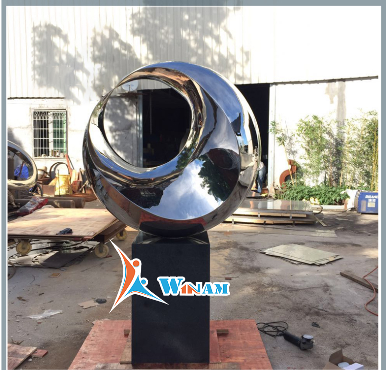 Large abstract outdoor metal garden sculpture