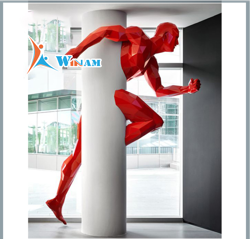 Large abstract stainless steel running man sculptur
