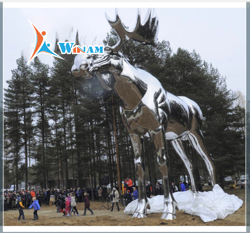 Large stainless steel shiny metal moose statue sculpture