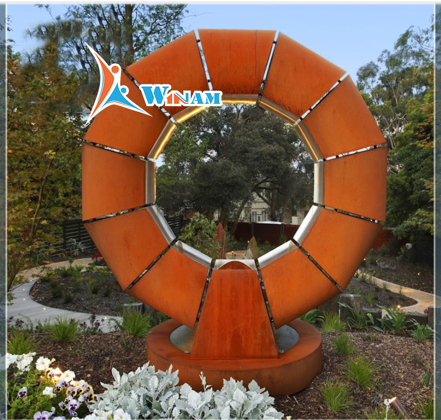 Corten steel water wheel outdoor sculpture