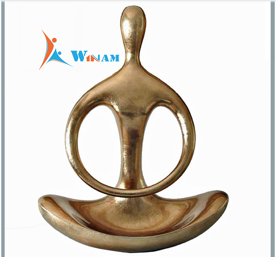 Modern abstract figure gold sculpture
